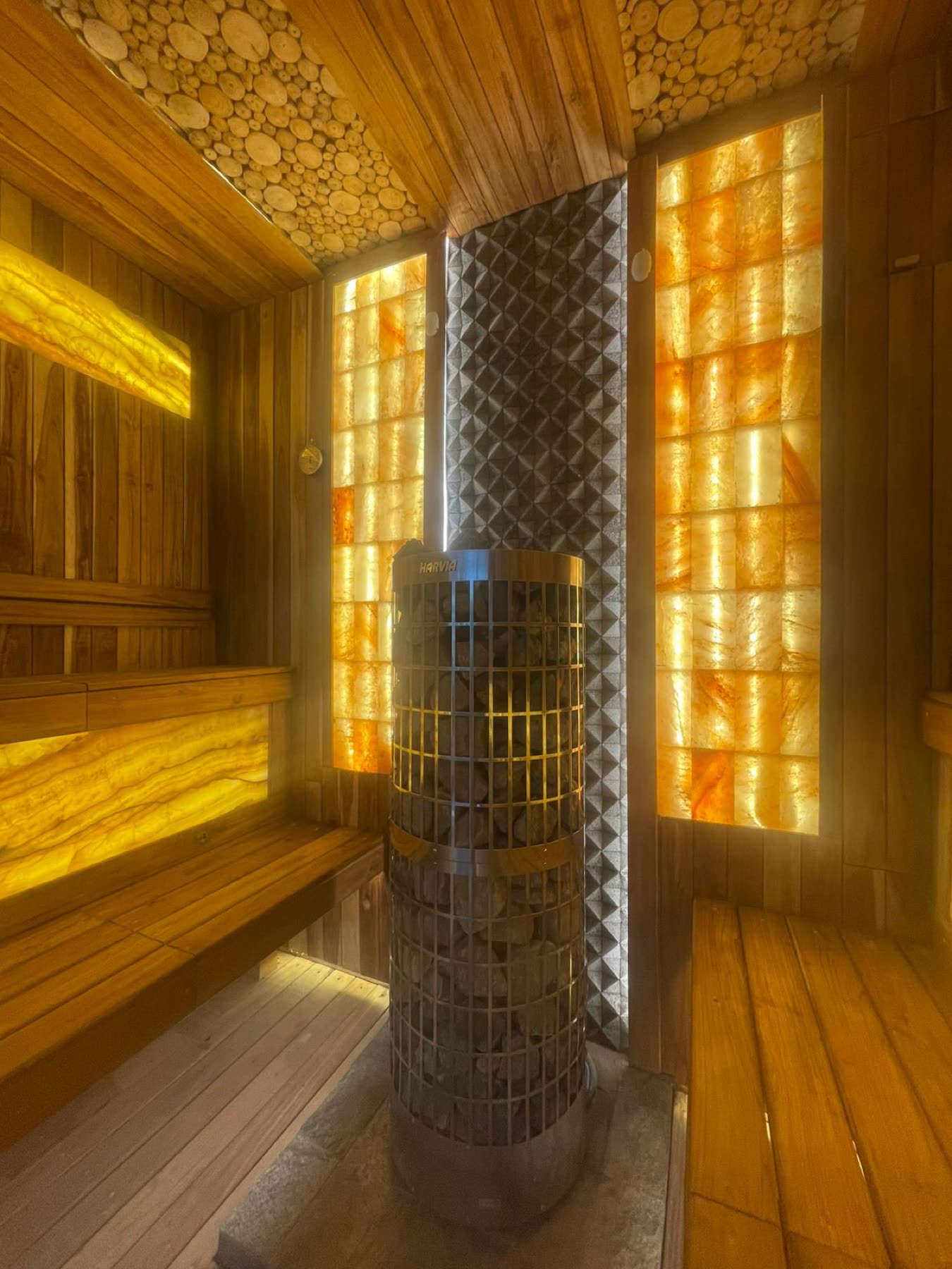 Renovated premium sauna in Bali with backlit onyx, Himalayan salt and a Harvia heater